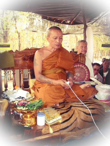 Blessing Amulets with Sinjana Cords during a Blessing Ceremony
