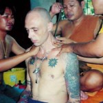 Ajarn Spencer Littlewood gets Yant Gao Yord from Luang Pi Pant at Wat Bang Pra in 1997