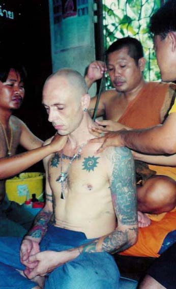 Ajarn Spencer Littlewood gets Yant Gao Yord from Luang Pi Pant at Wat Bang Pra in 1997