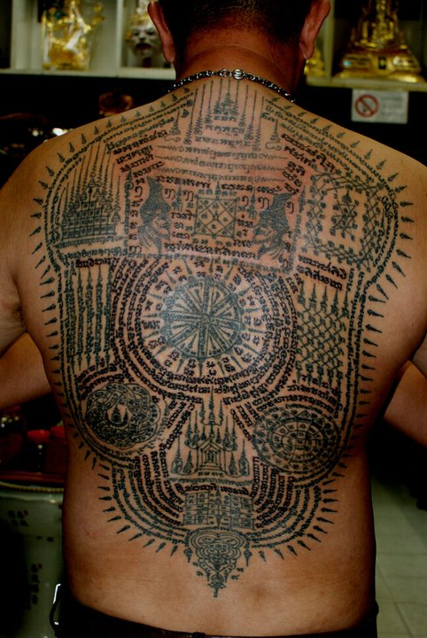 Full Back Piece Sak Yant Tattoos by Ajarn Man